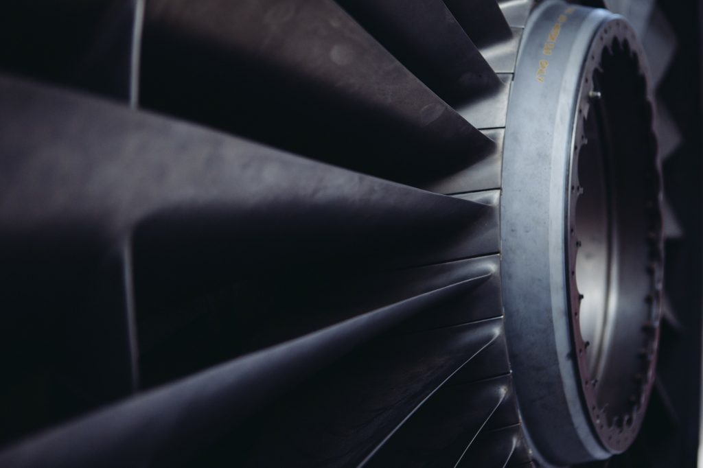 An air conditioner fan, used to represent the concept of "average cost to replace heating and air conditioning."